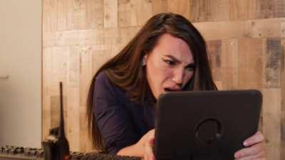 New hire Summer Hart gets hands-on training from boss and maintenance worker in elevator