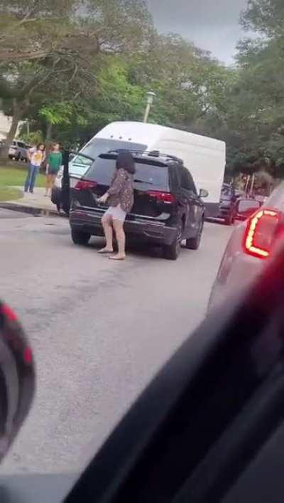 Driving up from behind the line and stopping oncoming traffic in the middle of a school zone to try to cut back in ahead of the line