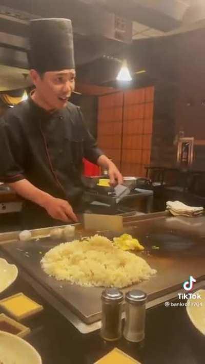 Just a lady being cringe with a chef who is cooking/performing for others too.