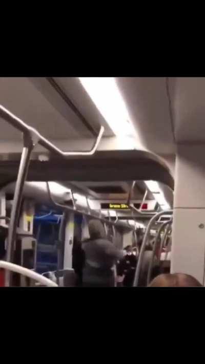Man starts smoking inside a tram. After being asked to put down the cigarette he savagely beats up a man that approached him to put it down himself