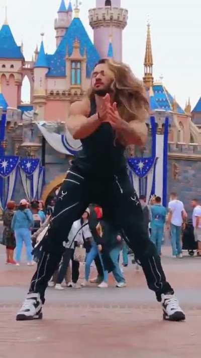 WHO IS MORE ANNOYING MR I CAN DANCE OR THE GUY RUINING THE SHOT? GOTTA LOVE DISNEY!