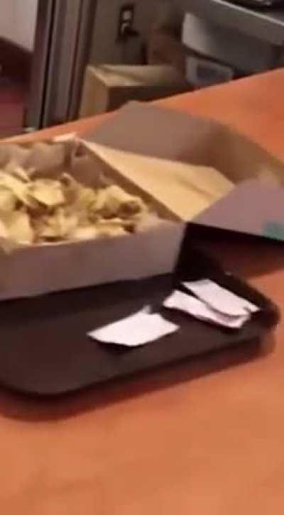 Lady goes berserk after not getting enough cheese on her Nachos.