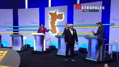 Datena se dirige ao púlpito de Marçal e apresentadora chama a segurança