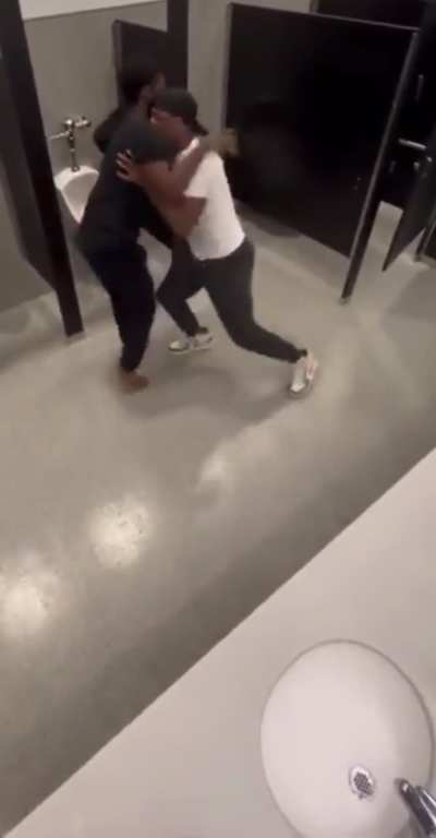 Bathroom Matrix: Agent Tyrone vs Barefoot Neo. Slick Defense. Zero Footwear. One Beanie That Should Never Be Worn Again