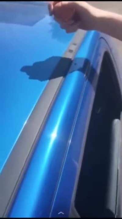 Frying an egg on a car roof