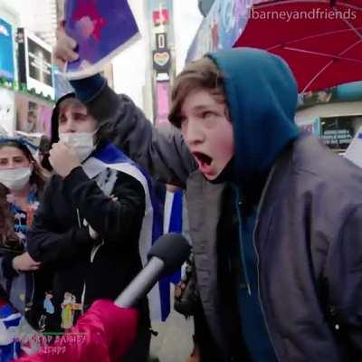 Angry racist tells a braless woman that she is dressed like “a suicide bomber”