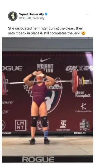 Weightlifter popped her dislocated finger back in place.