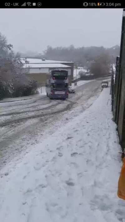 What could go wrong driving a bus down a snowy slope?