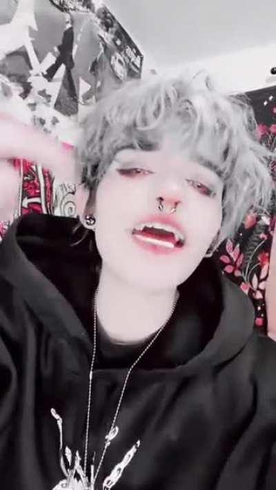 The braces and dum dum sucker really set the alternative scene