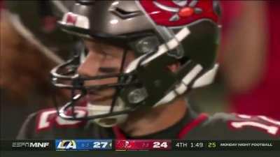 Buccaneers QB Tom Brady overthrows his receiver by several yards, resulting in a game-clinching interception for the Los Angeles Rams on Monday Night Football