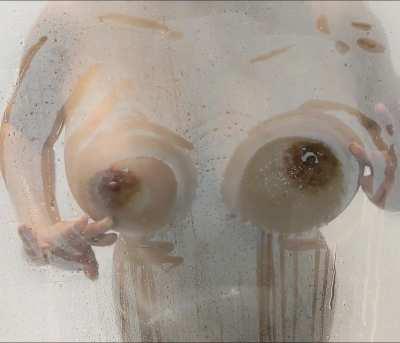 Busty MILF Showering