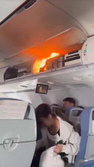 lithium battery in a passenger’s overhead bag caught fire