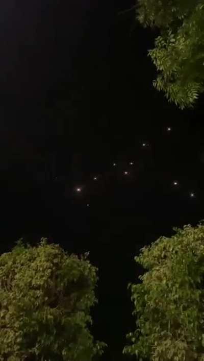 Palestinian rockets (right to left) intercepted over Tel Aviv