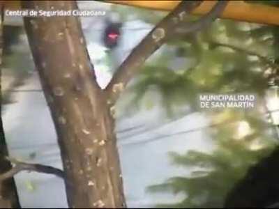 Three guys run from the police on a motorcycle