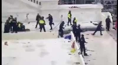 January 6th 2021 insurrectionist being beat by brave law enforcement officers