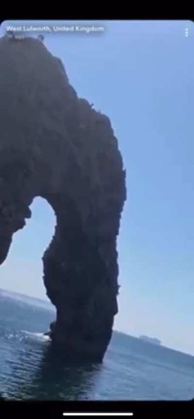 Jumping off Durdle Door