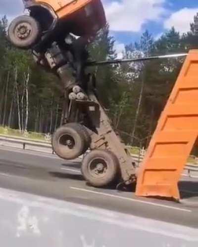 Idiot in a c.. dump truck.