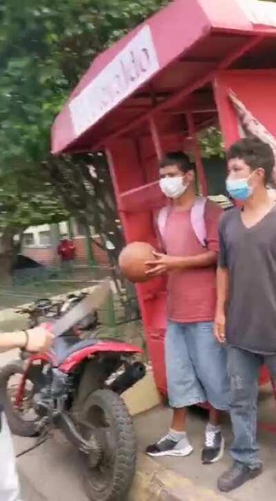 WCGW with swinging a machete towards a reporter, in front of the cops