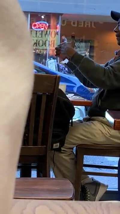 He had been sitting at this coffee shop for nearly 3 hours by himself, making extremely complex origami flowers and doing tricks