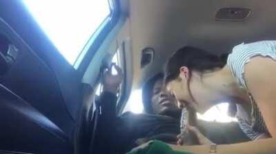 Sucking that big fat cock on the backseat