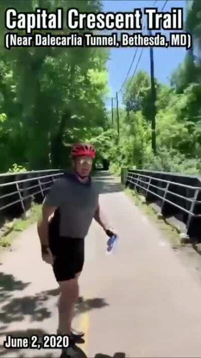 This grown a*s man just did this to a little girl who was posting flyers in support of George Floyd. This is sick.