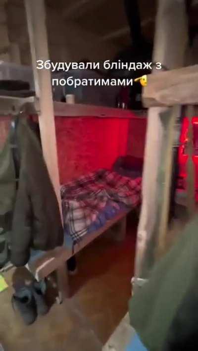 Ukrainian Soldiers show us their dugout.