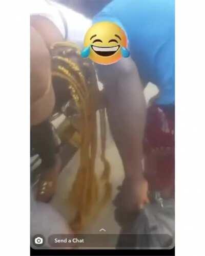 WCGW riding a motorcycle with braids