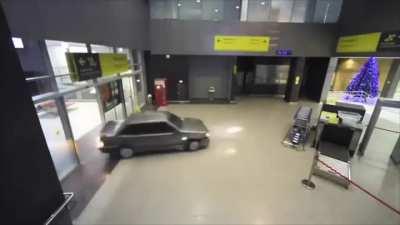 Drunk bloke drives his way through an airport