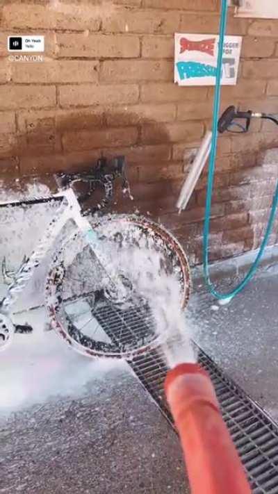 Chad Bottas washing his bike...