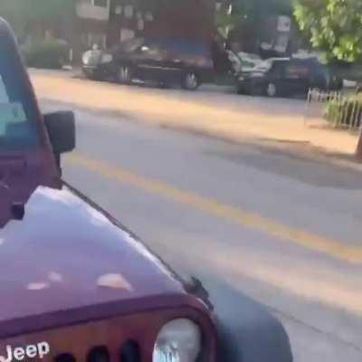 This lowlife thug hitting an older man from behind with a brick