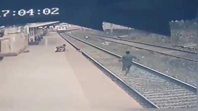 Mayur Shelkhe a railroad worker in India saves a child who had fallen onto the tracks from the path of an oncoming train.