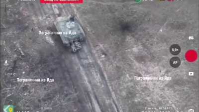 A Ukrainian Infantry Squad is hit by a drone dropped grenade near Zhuravlevka - Belgorod Region - As they exfil in an IFV one soldier falls out 