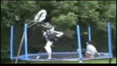 Playing basketball on a trampoline