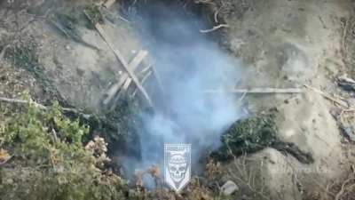 Ukrainian Soldiers of the 5th Lubart Battalion of the 12th Azov Brigade litter a Russian position with 2 enemies using small arms fire and grenades near New York, Donetsk