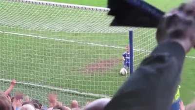 Entire crowd cheers on this kid as he scores a goal
