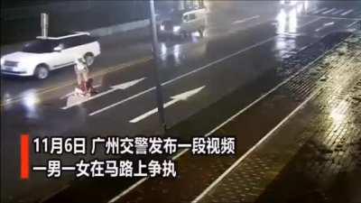 Sitting on the road.