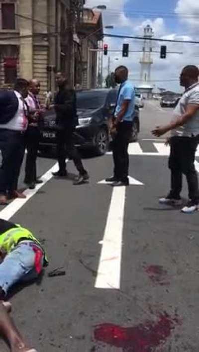 Shot in the head and still moving.