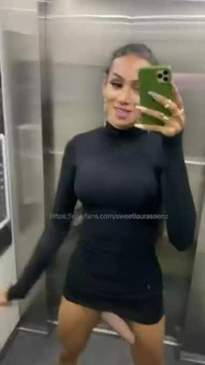 She shakes her huge cock in the elevator!