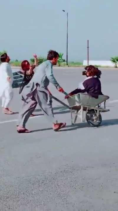 Camera Man uses Wheel borrow for low budget local film