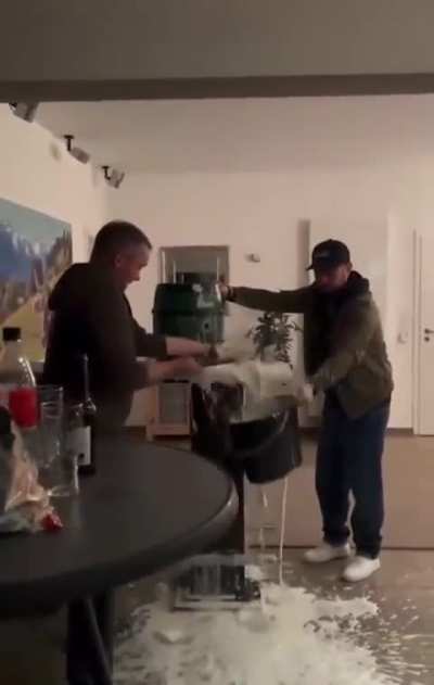 tapping a cask of beer