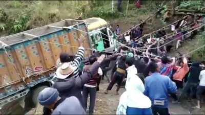 Nagaland village comes together to pull a truck out of a gorge !
