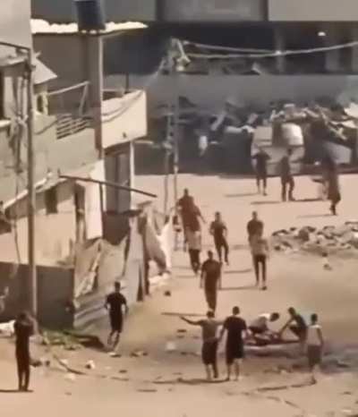 An Israeli drone targeted a child with live ammunition on a street in northern Gaza. When citizens gathered to rescue and help him, they were directly bombed.