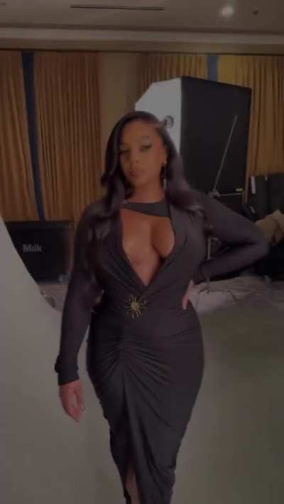 Ashanti wearing a black dress | IG 7/11/2025