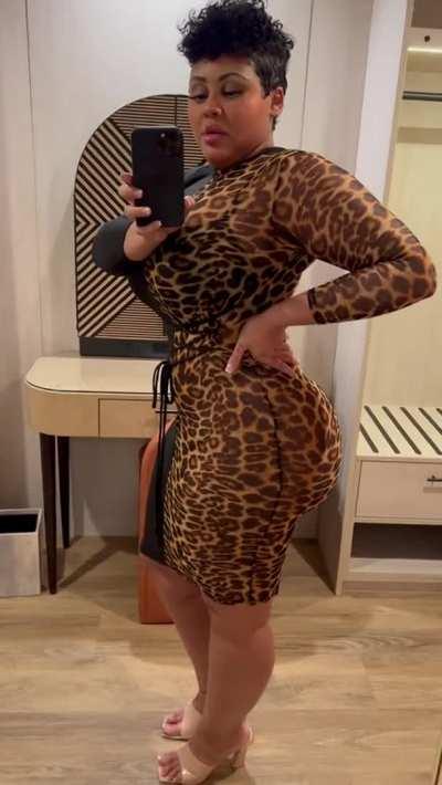 Body Tight In A Half Leopard Print Dress.