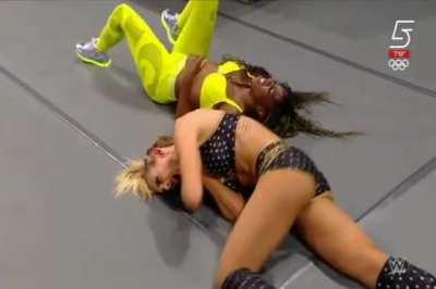 Pathetic Charlotte Flair left helpless outside the ring by Naomi