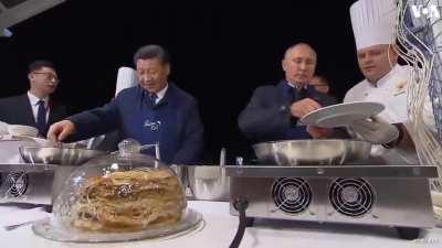 Xi Jinping having a romantic dinner with Putin