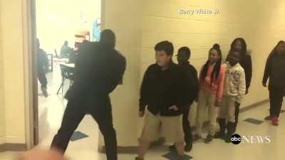 Teacher Has Personal Handshake for All His Students