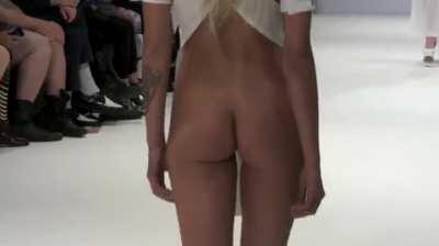 Wearing just an apron on runway