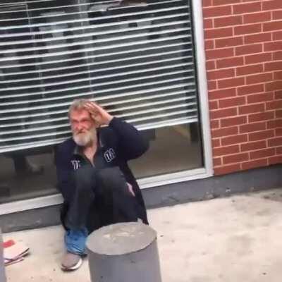 Man salutes homeless veteran then pours liquid on him