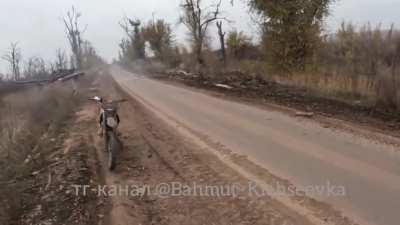 GoPro footage from motorbike Stormtroopers from 1008th Motorized Rifle Regiment firing at enemy FPV drone lying in ambush on side of road.